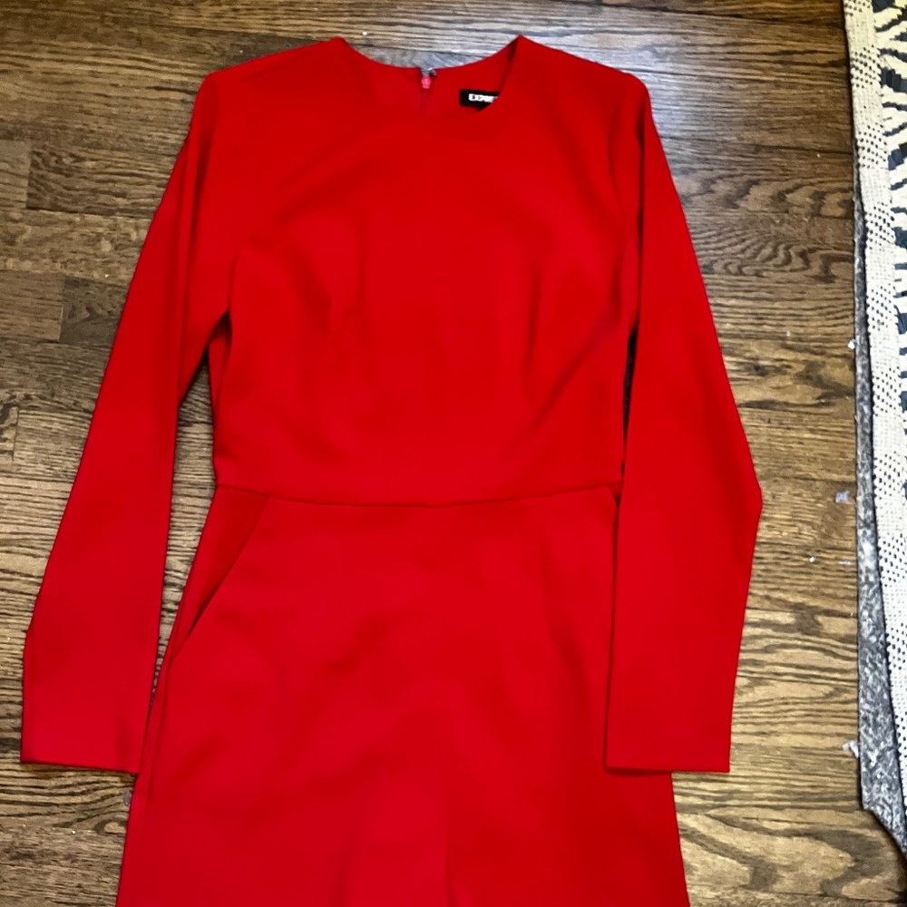 Red romper dress with pockets for your red era. Only used once